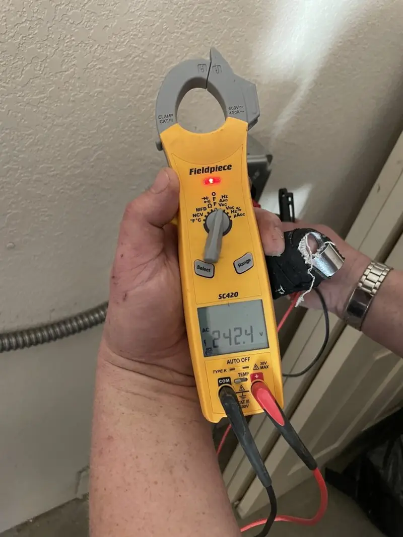 Voltage testing with clamp meter during Ceiling Fan Installation in West Lampeter